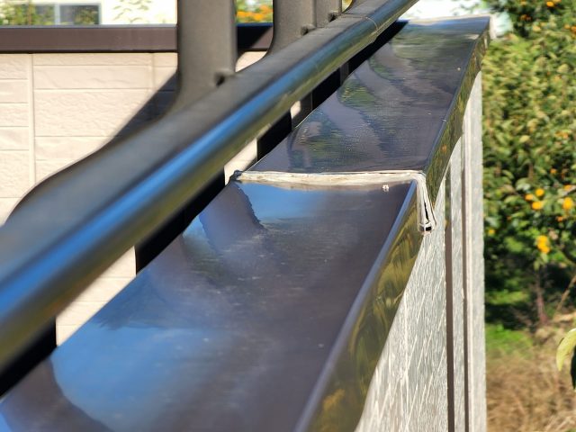 阿智村K様_ベランダ笠木の変形